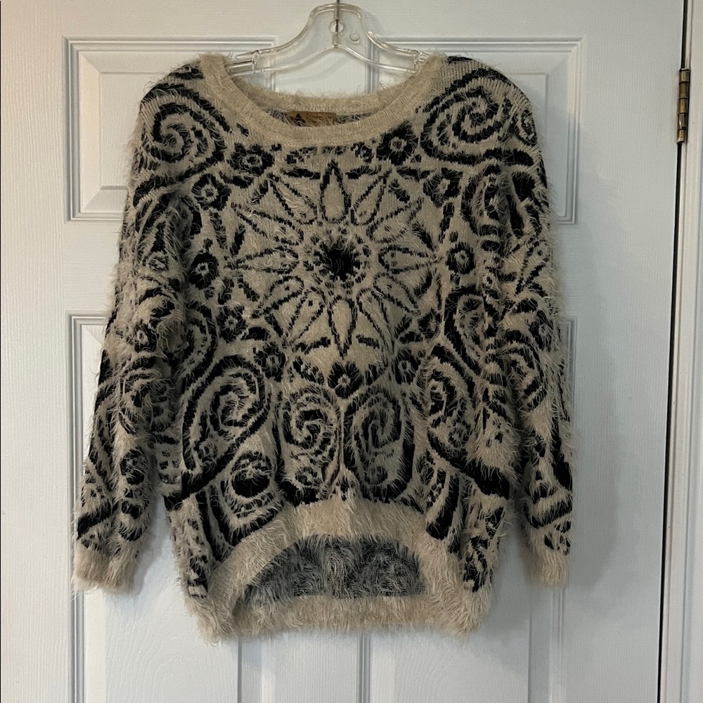 Elegant Black and Cream Floral Sweater